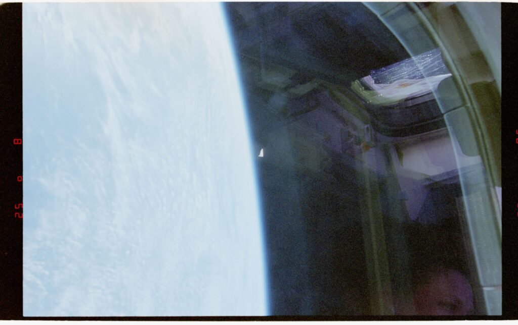 Unidentified object photographed above Earth from Space Shuttle Columbia during STS-80 in 1996